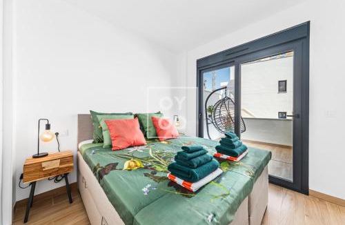 Torrevieja Apartment | Casa de Adamant - Ground floor resort apartment with BBQ, shared jacuzzi and pool by OYOOSTAYS