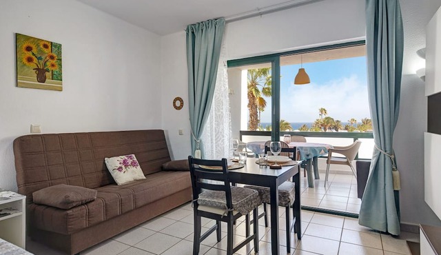 Vacation Apartment 'Al Sole Studios Playa Roca' with Sea View, Shared Pool and Wi-Fi